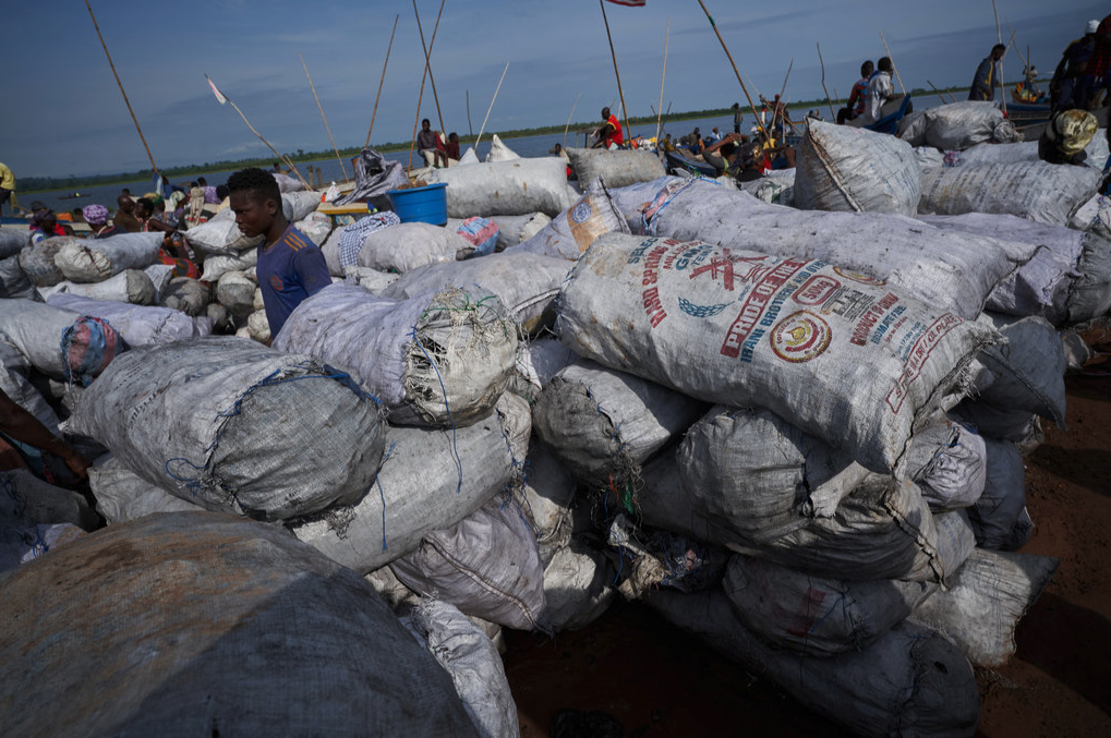 Sacks of charcoal for sale in Ghana, where poor fish preservation leads  fishermen and fishmongers to burn charcoal as an alternative livelihood.