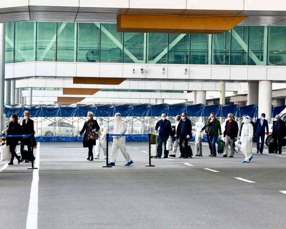 WHO scientists arriving in Wuhan, China in January 2021