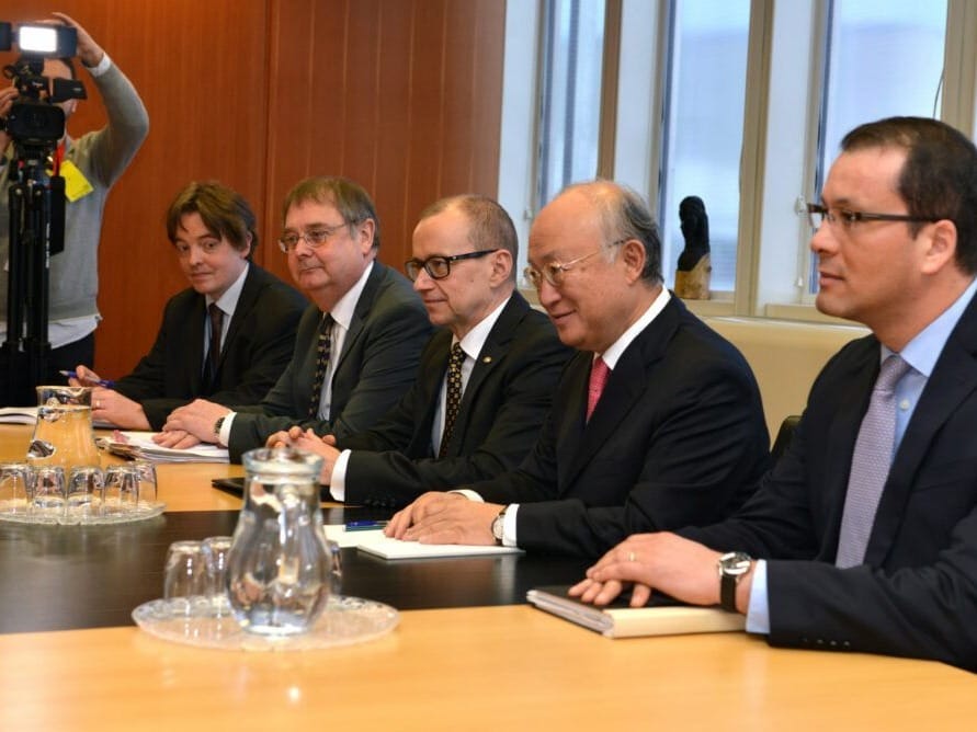 IAEA's Director General Yukiya Amano, second from right, meets with Iran's Foreign Minister Mohammad Javad Zarif in 2014.