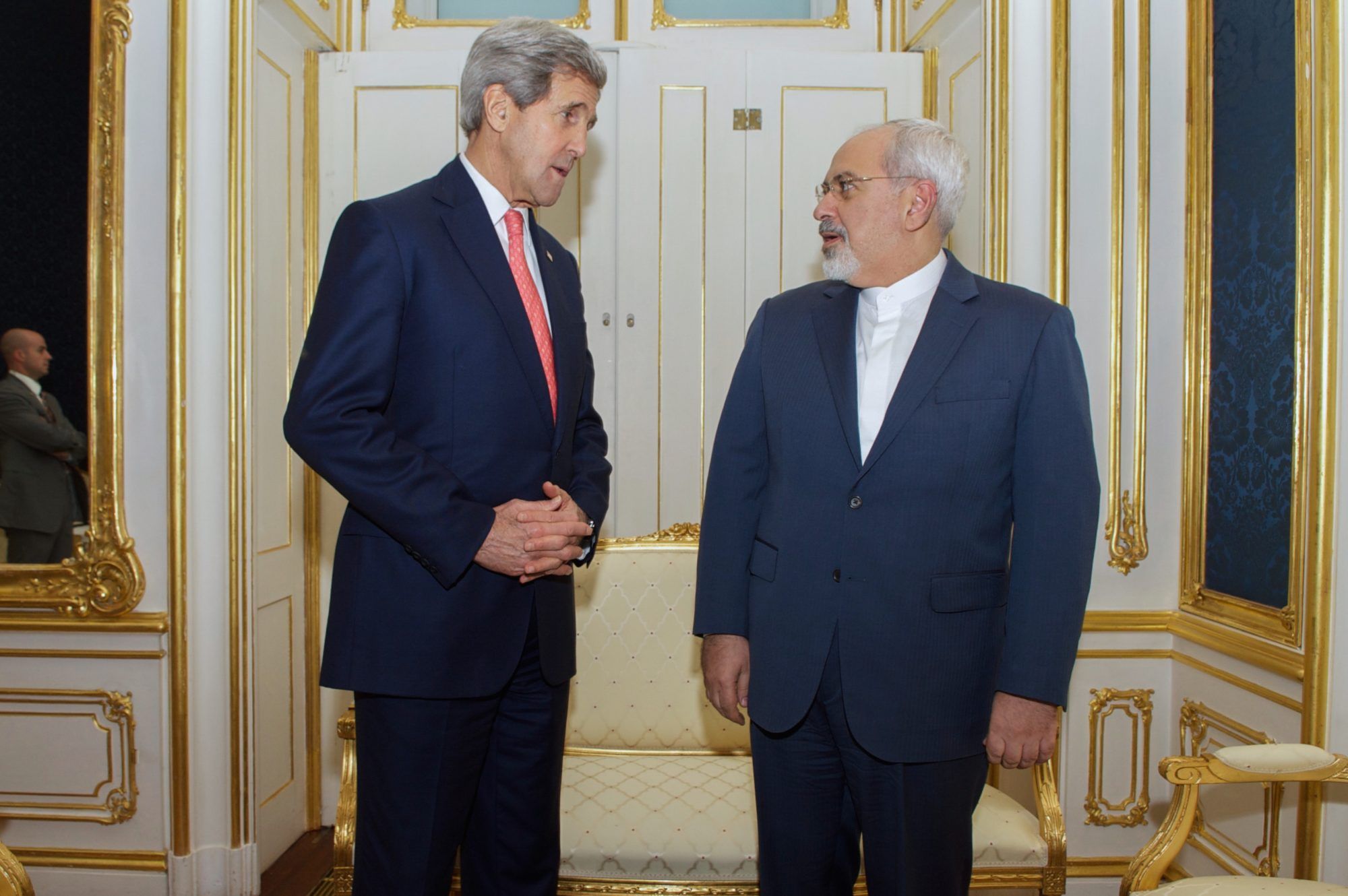 Then-U.S. Secretary of State John Kerry negotiates with Iran's Foreign Minister Javad Zarif.