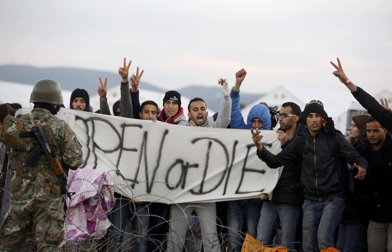 Protesters at the border between Macedonian and Greece.