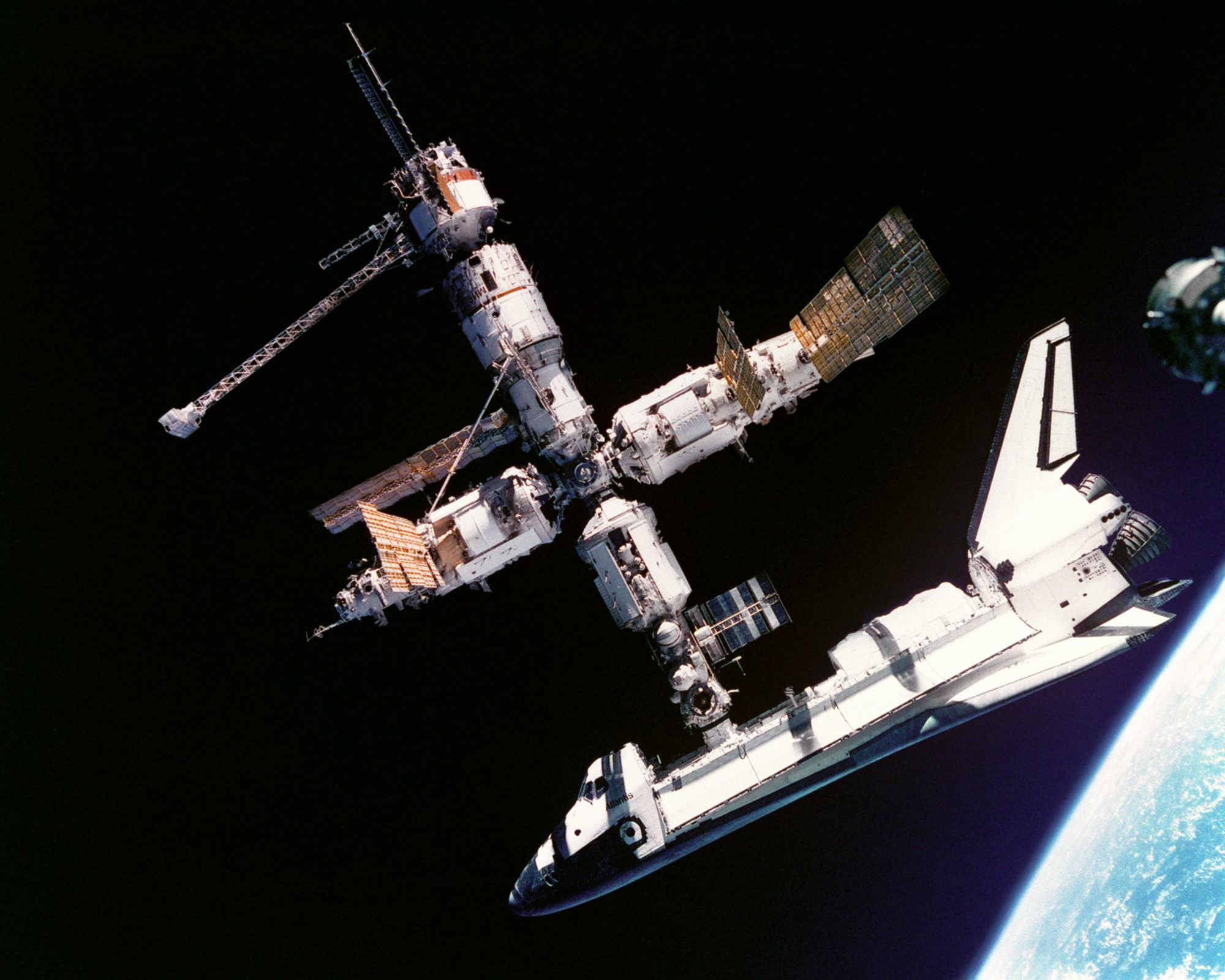 U.S. Space Shuttle Atlantis connects to Russia's Mir Space Station.